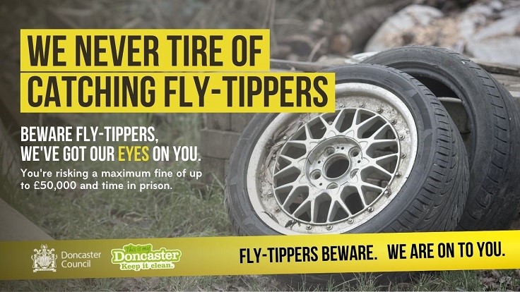 Fly-Tippers Beware Poster showing abandoned tyres